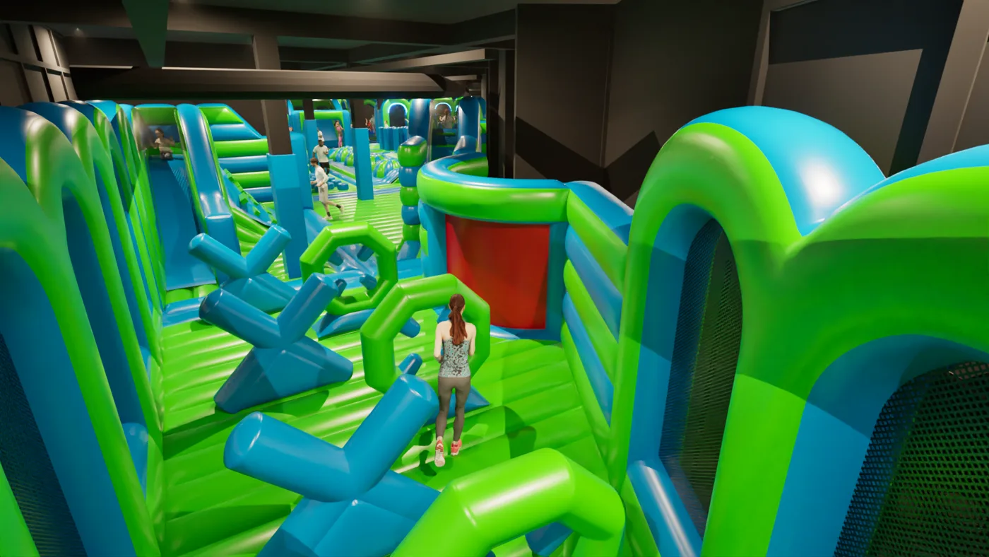 A render of an obstacle section with blue cross-shaped inflatable barriers, a red panel and a girl climbing through